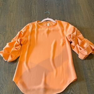 Orange puff sleeve dress top